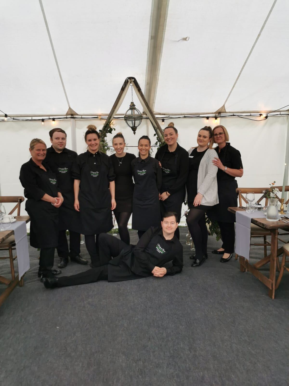 The Plenty Of Thyme team posing for an image inside a venue - come and join us as casual event staff!