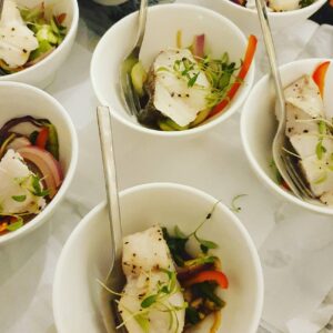 Colourful buffet of freshly prepared vegetarian and vegan BBQ dishes, including salads and plant-based mains, curated by award-winning Essex caterers.