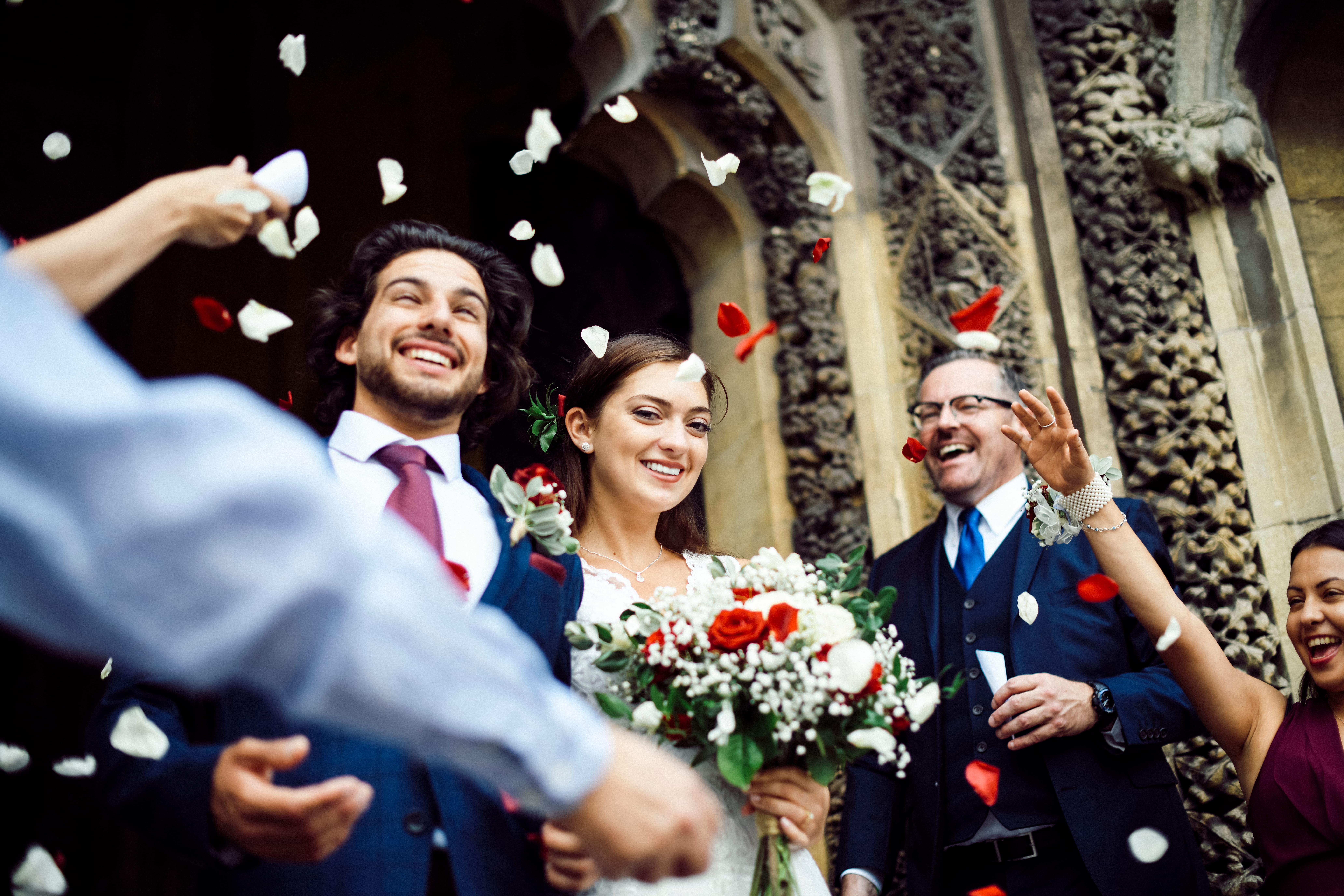 2026 wedding trends showing happy couple emerging from church after wedding