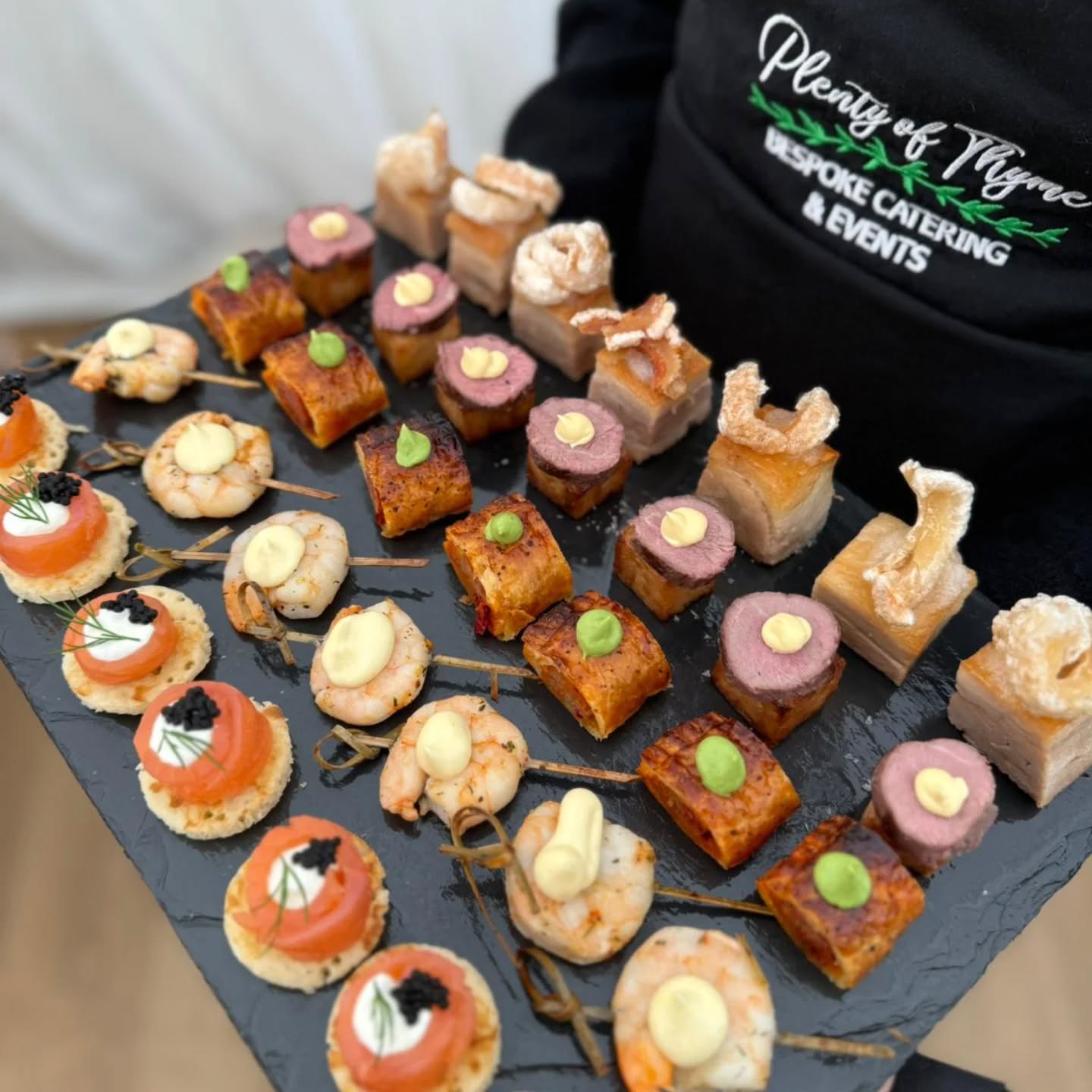 Outside Caterers Feature Outside caterers Plenty of Thyme hold tray of canapes